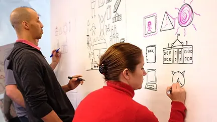 Participants learn to draw Icons at ImageThink's graphic recording training workshop
