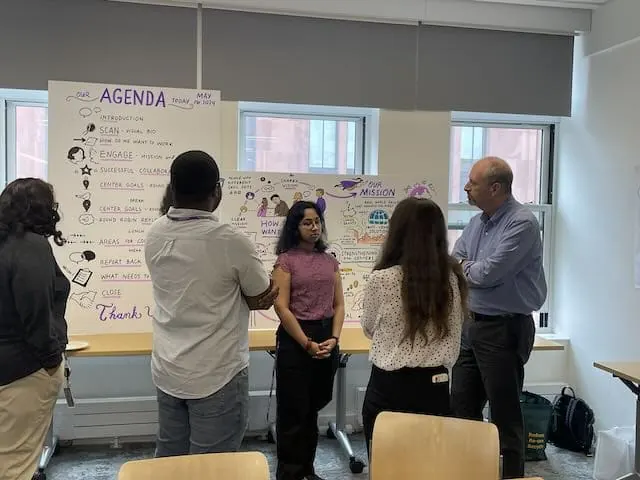 NYU GPH attendees work together to identify future collaborative efforts.